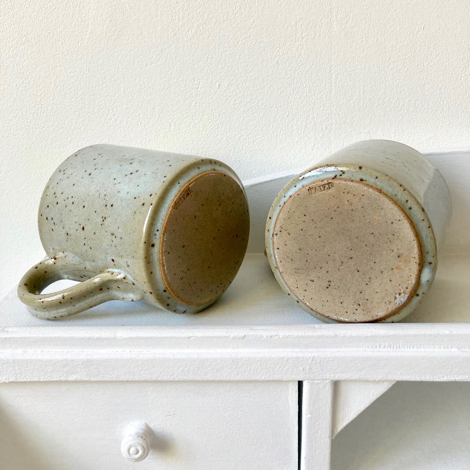 Pair of enamelled stoneware mugs