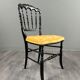 Set of four Napoleon III chairs in blackened wood, 19th century.