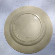 Flat round earthenware dish
