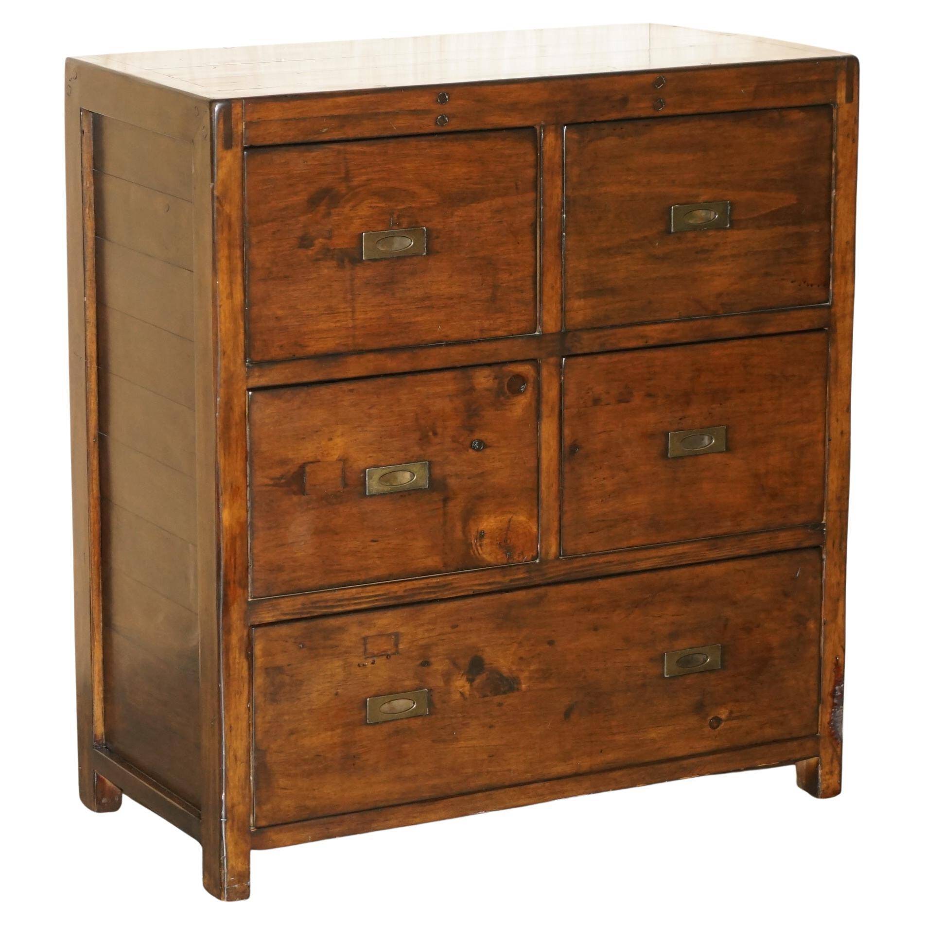 Large vintage hardwood furniture in military country style.