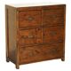 Large vintage hardwood furniture in military country style.