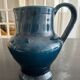 blue pitcher the potter chin