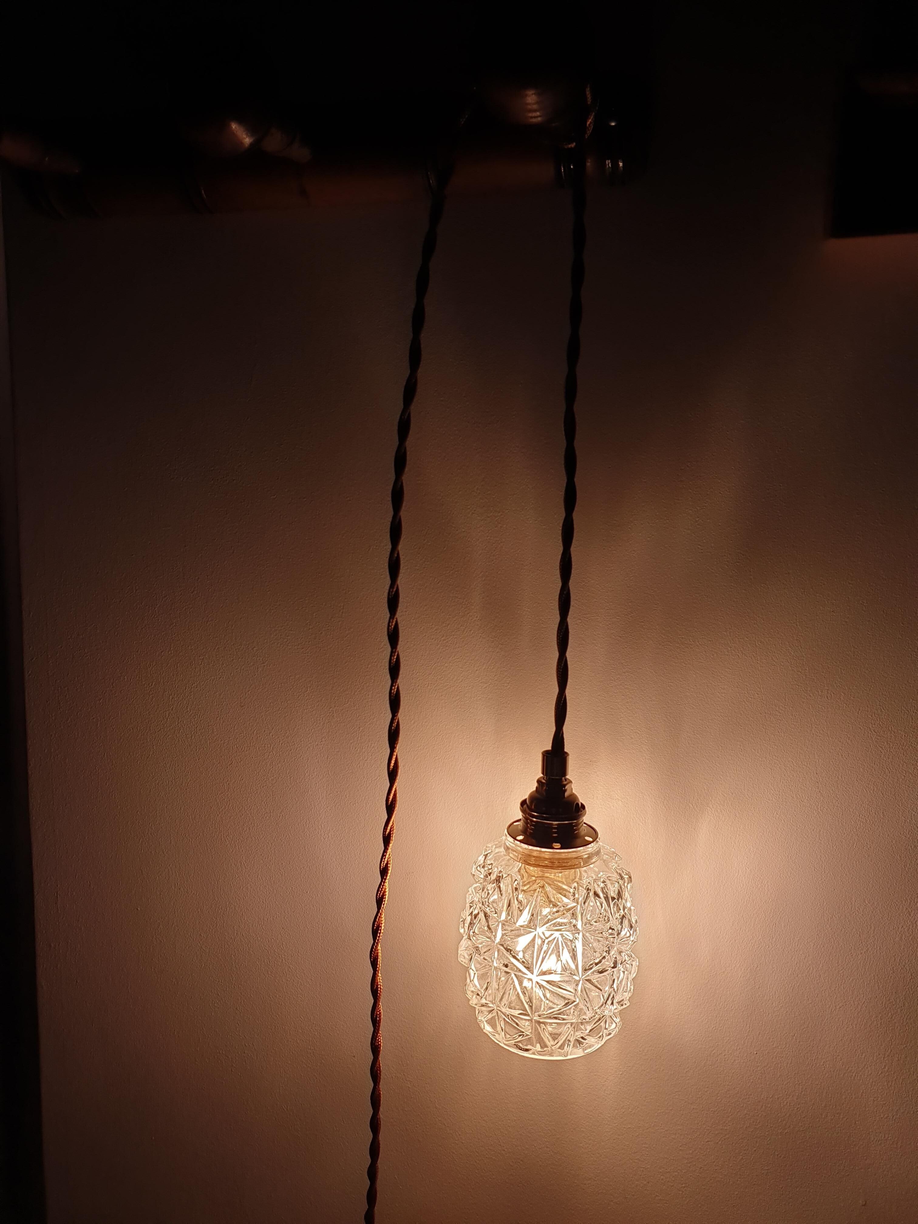 Chiseled glass hand lamp