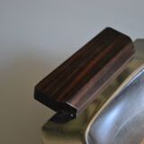 Art Deco serving dish in chrome metal with ebony handles.