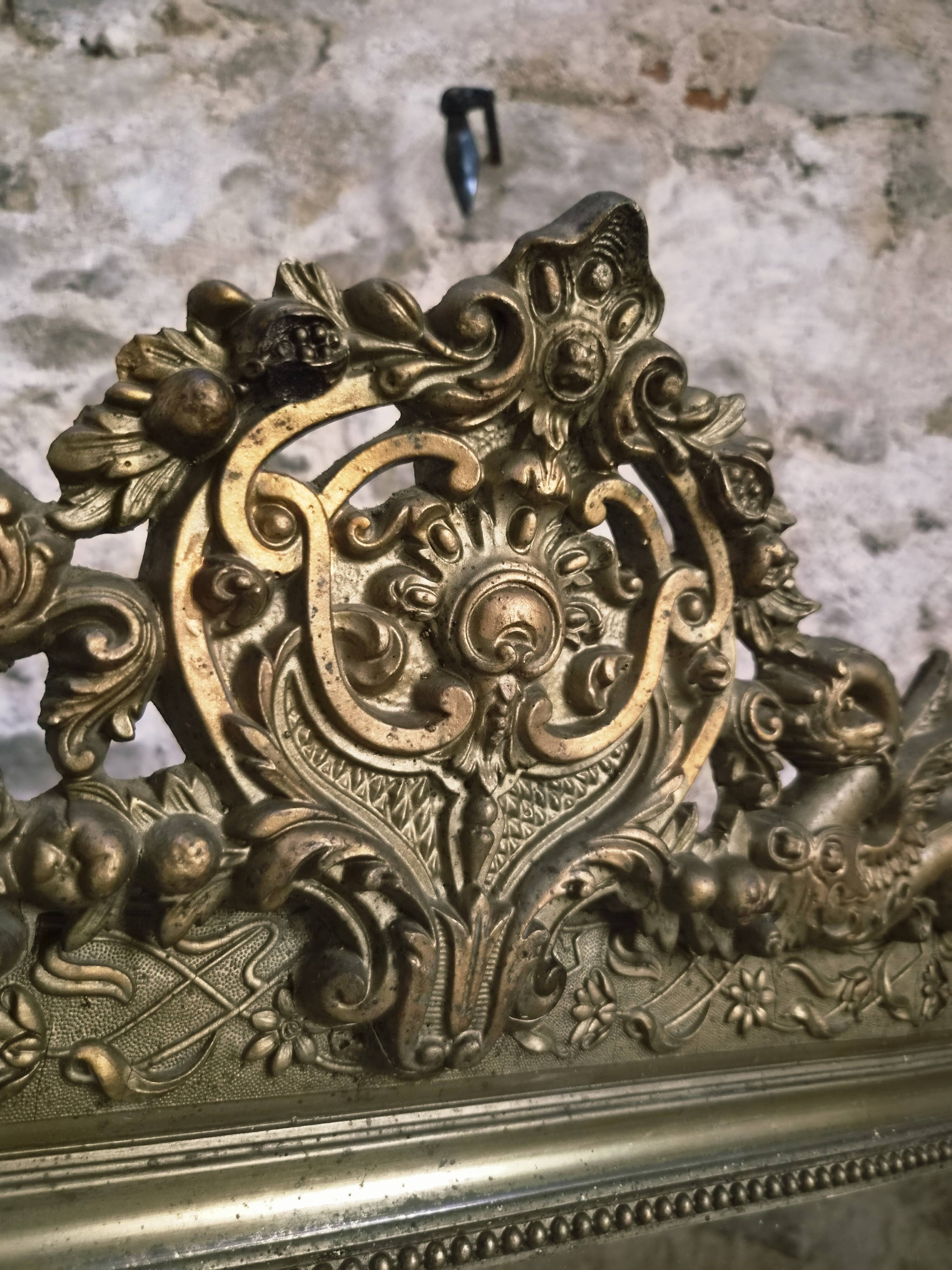 Large French mirror in Napoléon III style with a composition frame, circa 1880–1900.