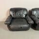 Large Set of Italian Space Age Black Leather Lounge Chairs with Brass