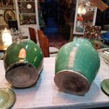 Pairs of jugs in varnished earth