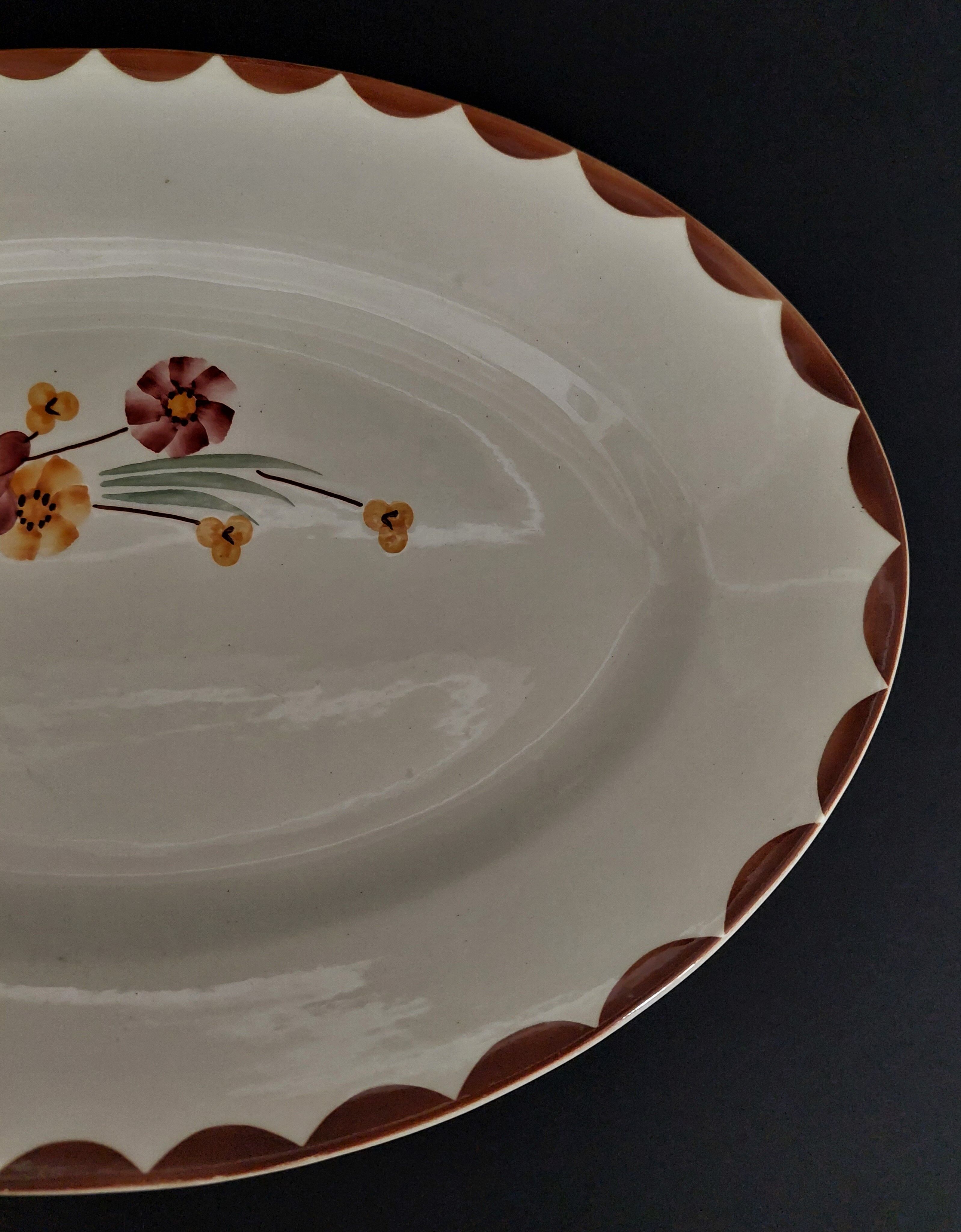 Oval earthenware serving dish HBCM Creil Montereau décor Huguette early twentieth century
