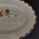 Oval earthenware serving dish HBCM Creil Montereau décor Huguette early twentieth century