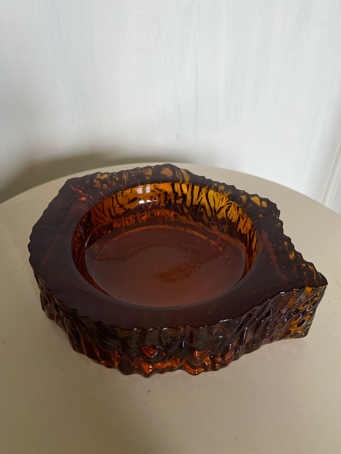 Ashtray in amber bubbled glass