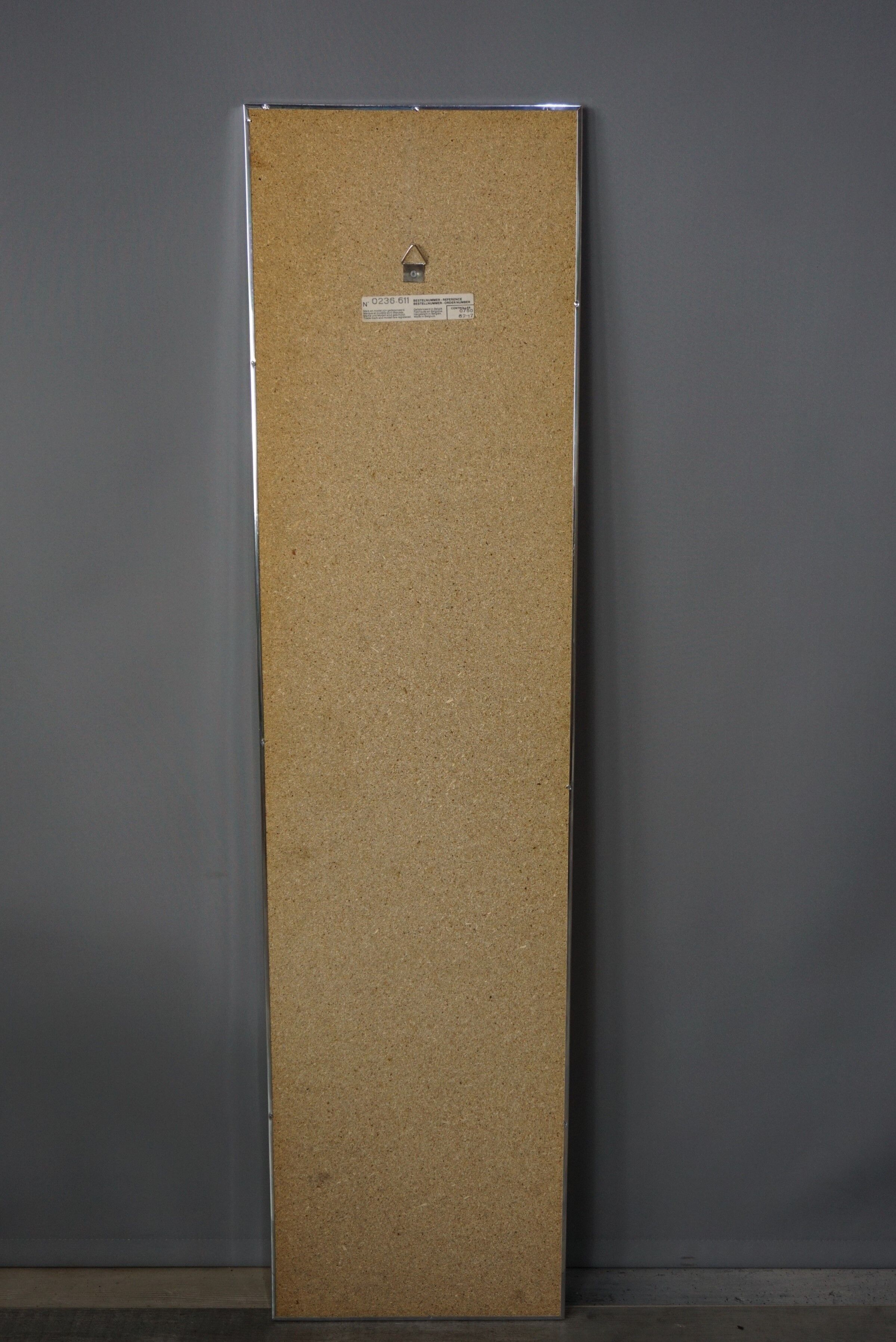 Chrome and screen-printed Deknudt mirror