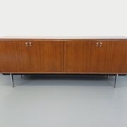 Vintage modernist enfilade in rosewood and chrome metal from the 60s and 70s.