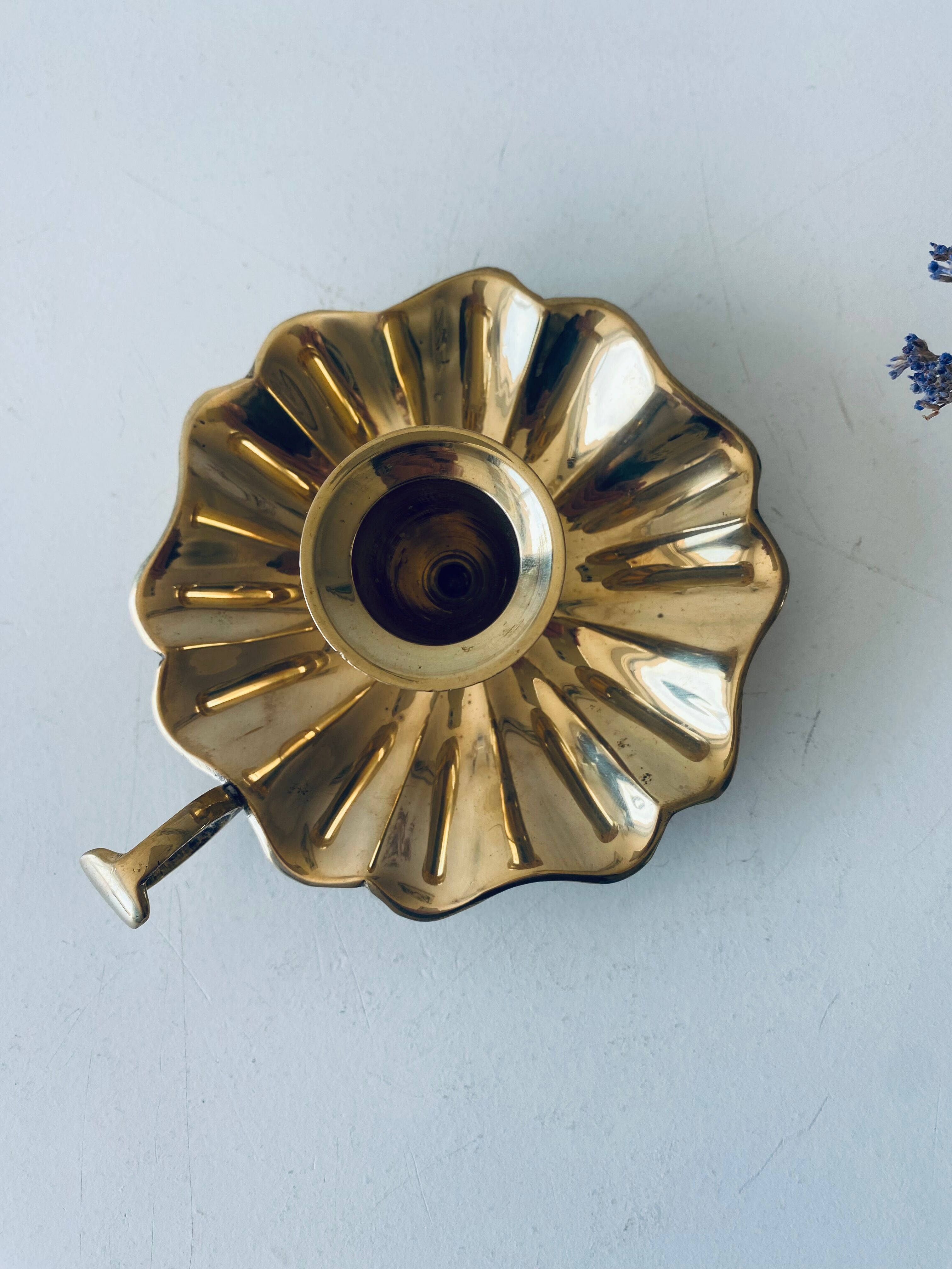 Indian candle holder in golden brass