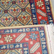 Colorful oriental runner with contrasting borders and cozy patterns, measuring 314x92 cm