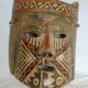 Masque en terre cuite à décors géométriques