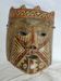 Masque en terre cuite à décors géométriques