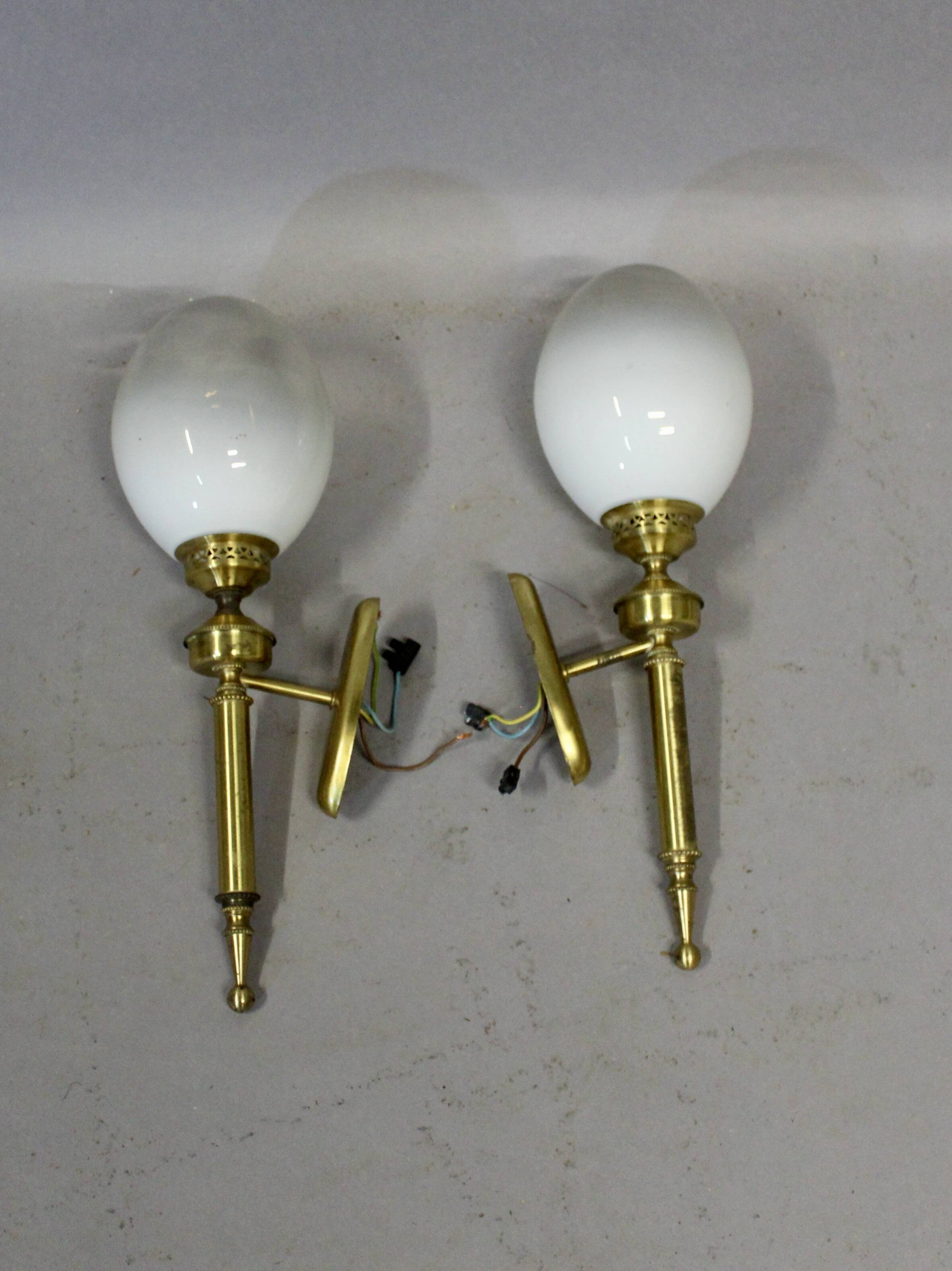 Pair of brass torchiere-style wall lights