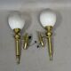 Pair of brass torchiere-style wall lights