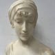 Sculpted marble group of a young woman's bust, 20th century.