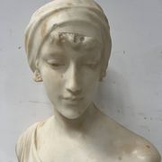 Sculpted marble group of a young woman's bust, 20th century.