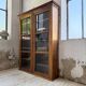 Glass-fronted walnut library 1900