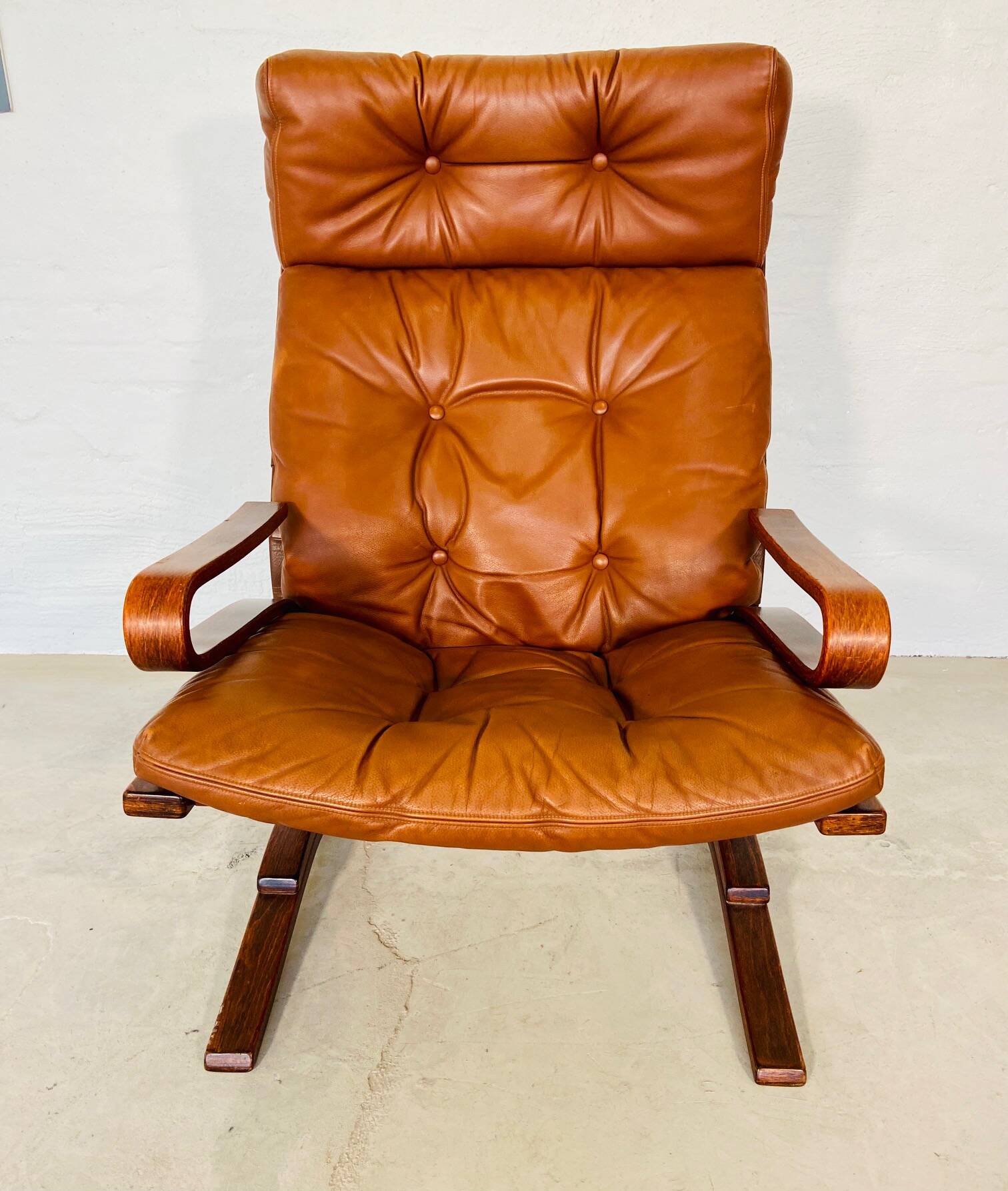 Vintage scandinavian cognac lounge chair by oddvin rykken 1960s