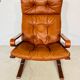 Vintage scandinavian cognac lounge chair by oddvin rykken 1960s