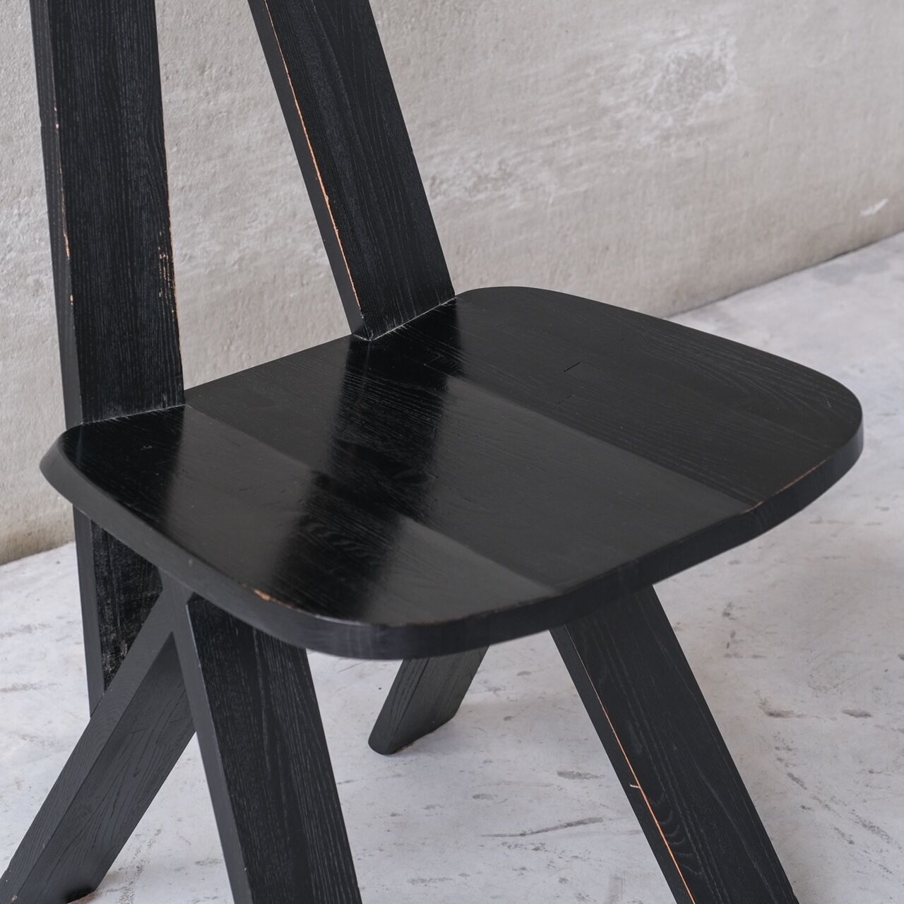 Set of six black dining chairs