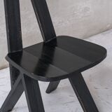 Set of six black dining chairs