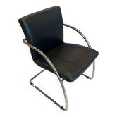 Vintage style black leather armchair with chrome frame