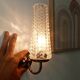 Vintage wall light in brass and etched glass.