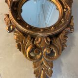 Miroir en bois doré Empire à décor d’aigle 40x97cm