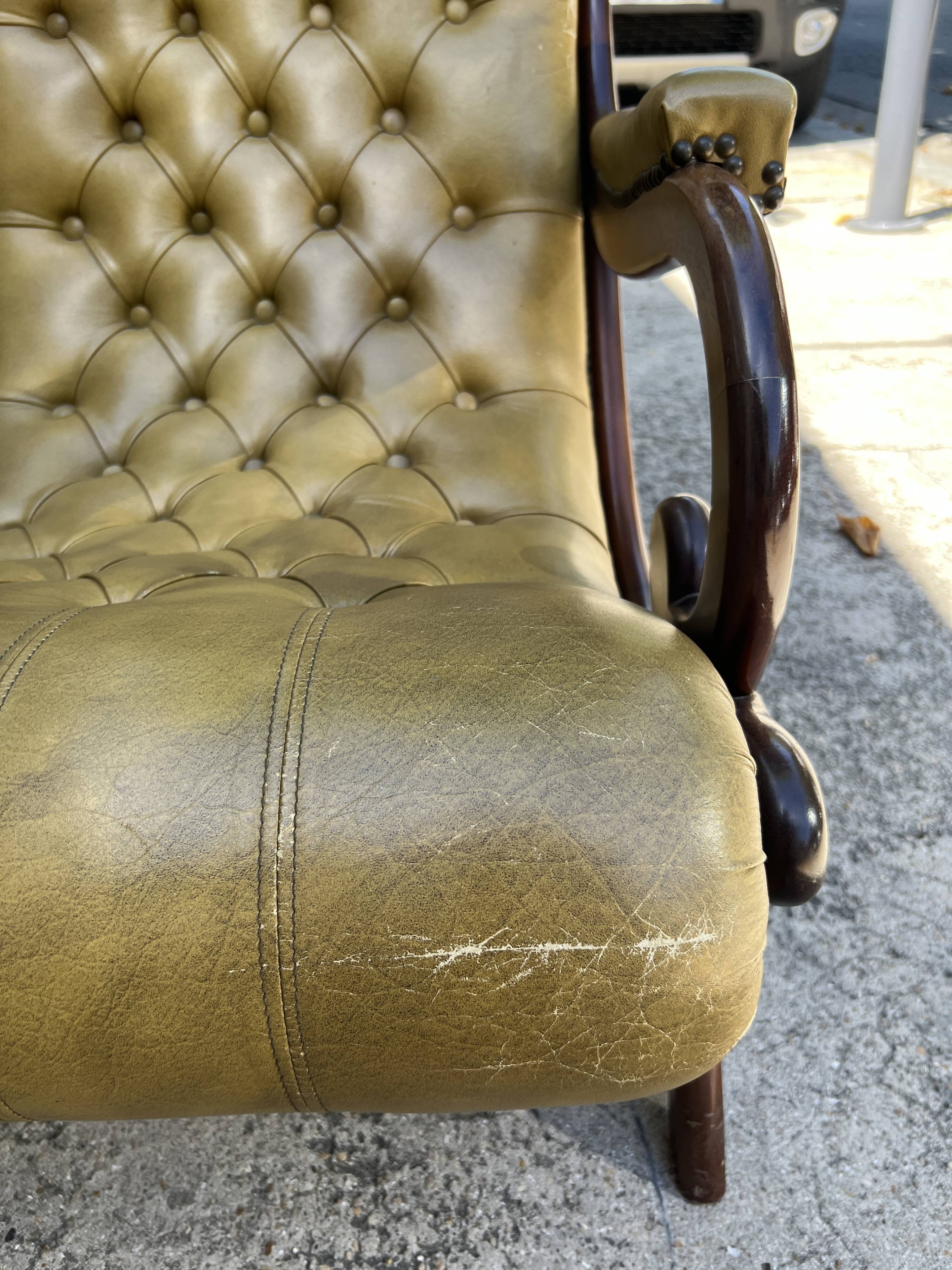 Victoria style green leather chesterfield armchair