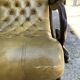 Victoria style green leather chesterfield armchair