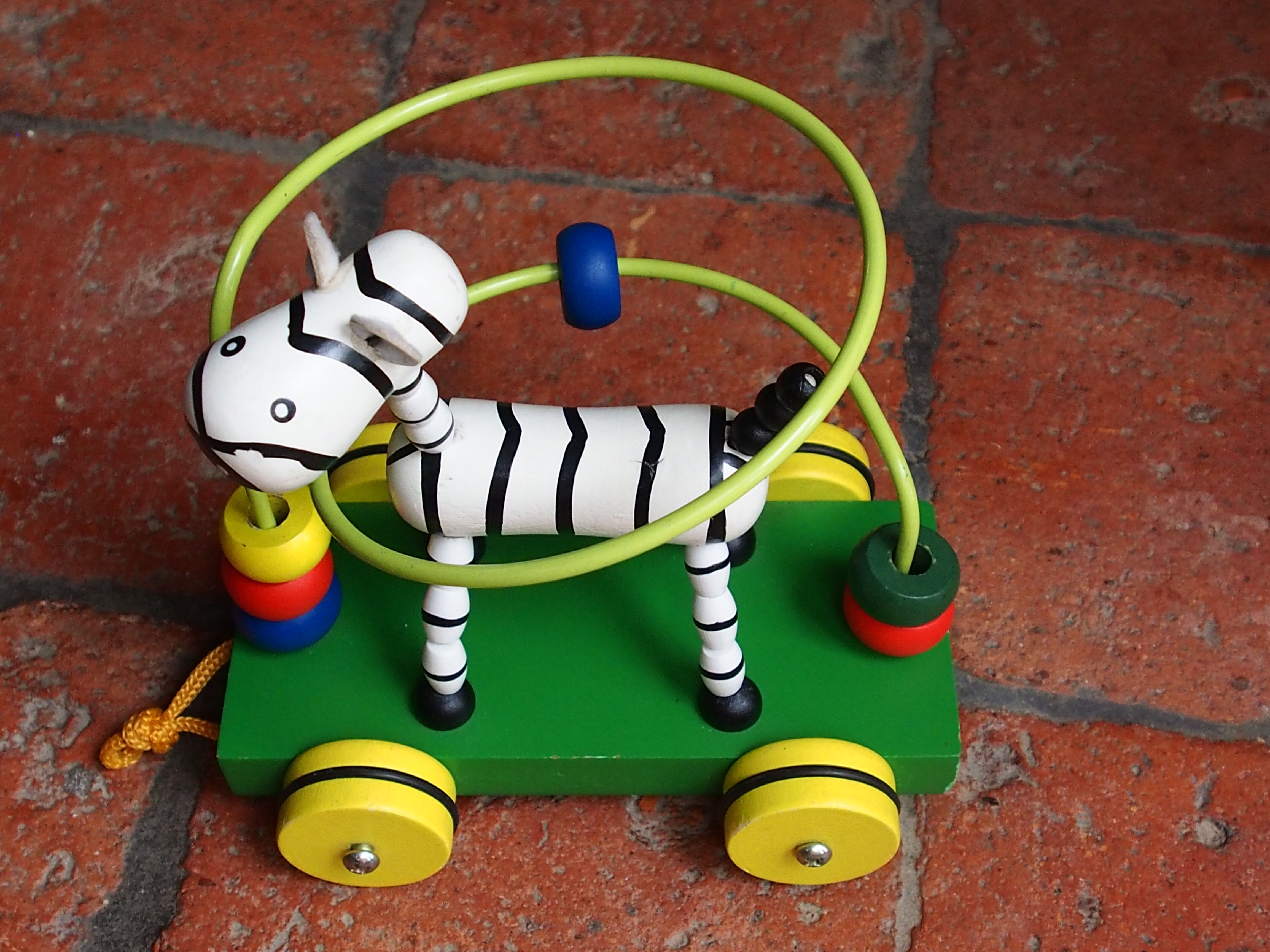 Old wooden toy, zebra car, to pull and push