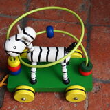 Old wooden toy, zebra car, to pull and push