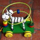 Old wooden toy, zebra car, to pull and push