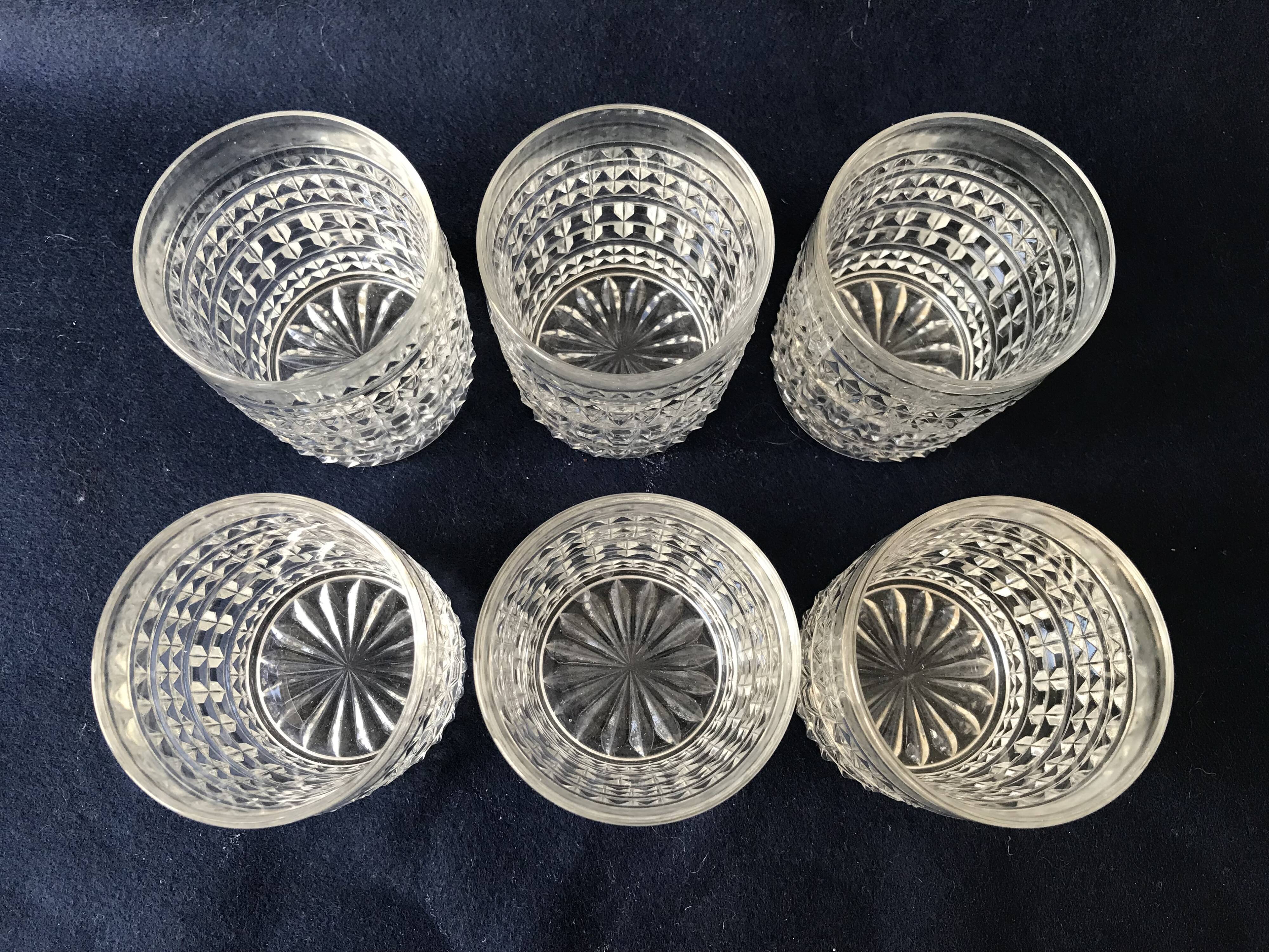 Six diamond-tipped cut glass cups