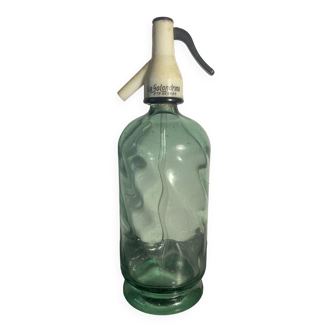 Ancien siphon en verre transparent