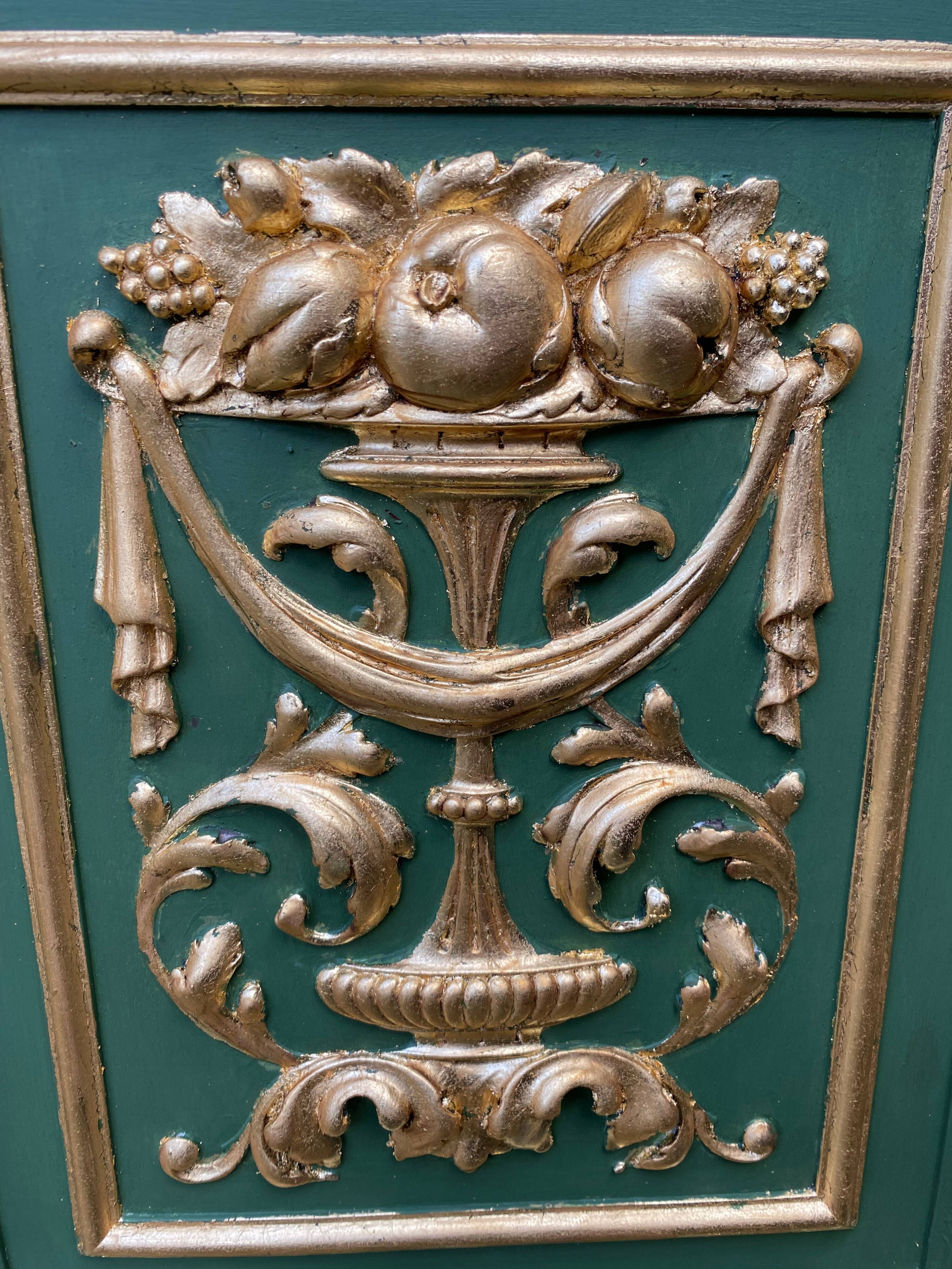Pair of carved and leaf-gilded wooden panels