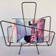 Vintage black metal magazine rack circa 19