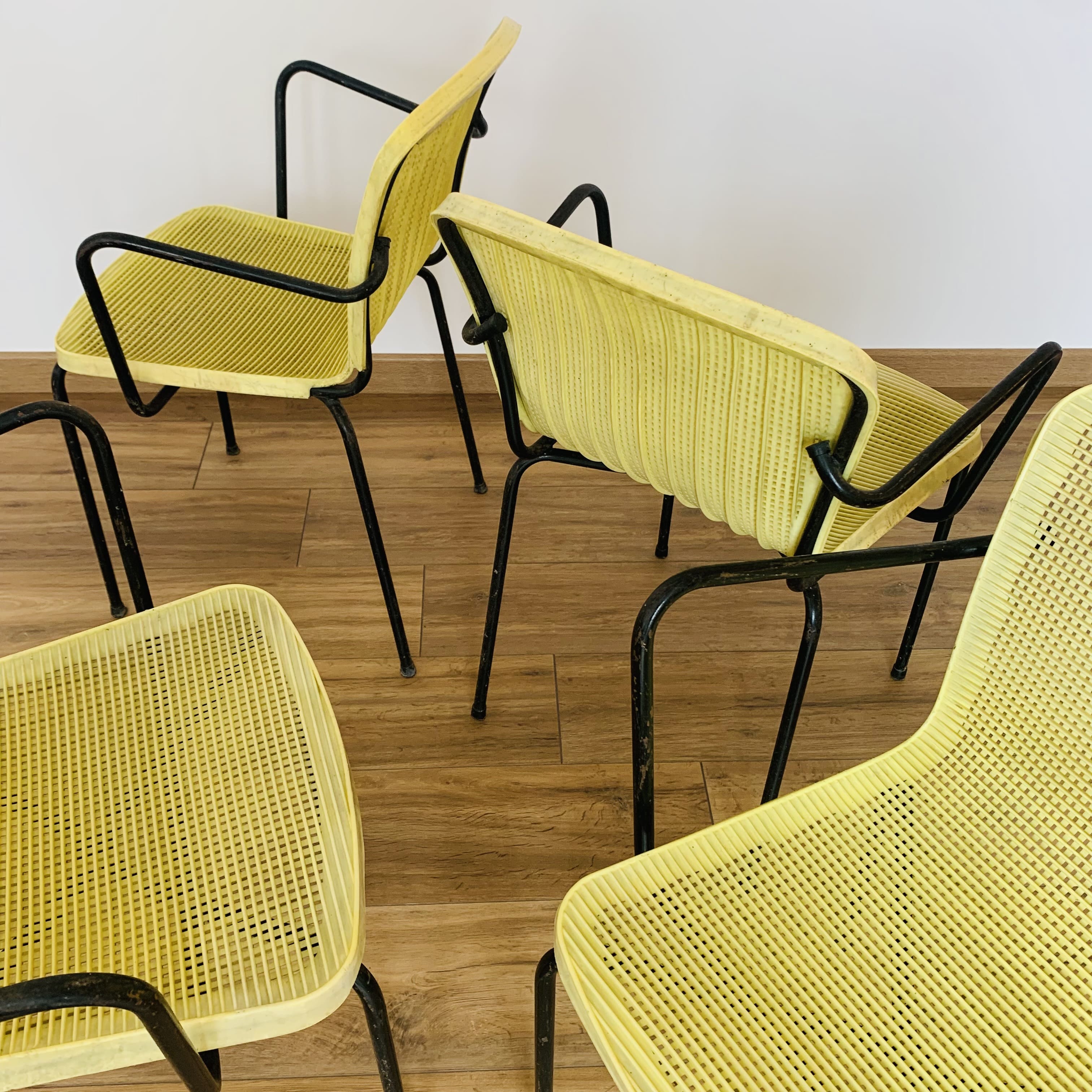 4 yellow outdoor armchairs