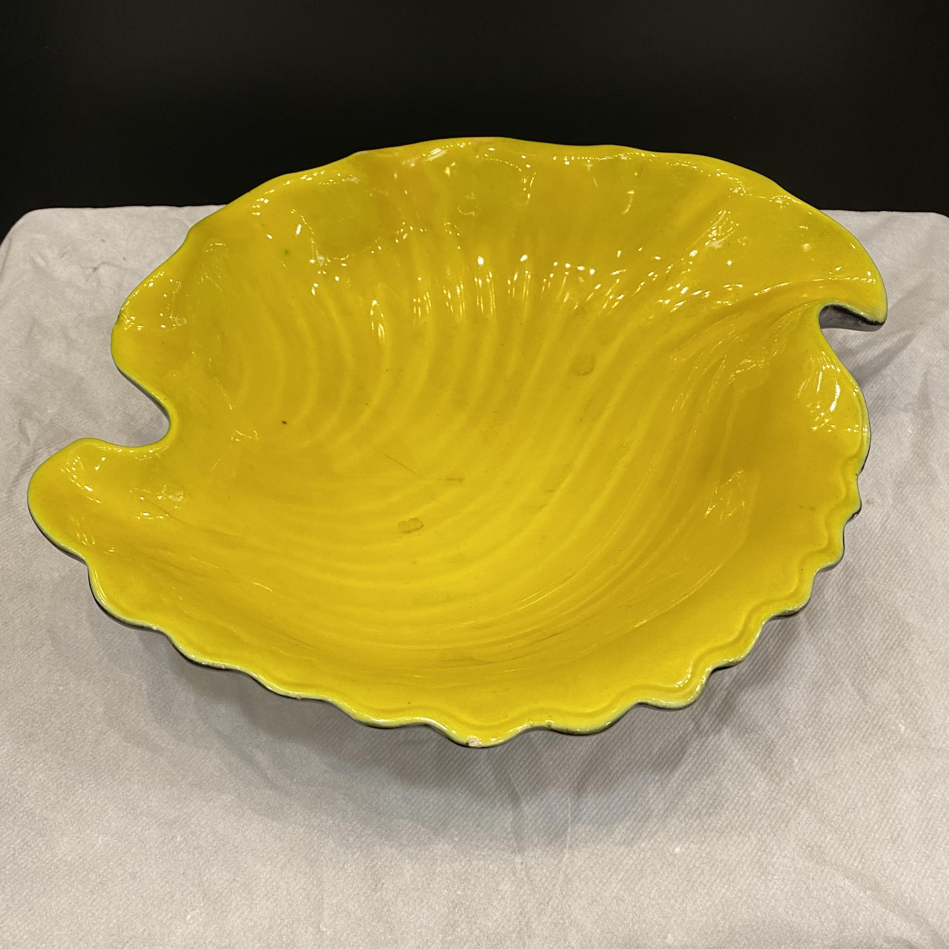Black and yellow Vallauris cermal cup