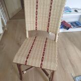 Beige and red rattan and resin chair