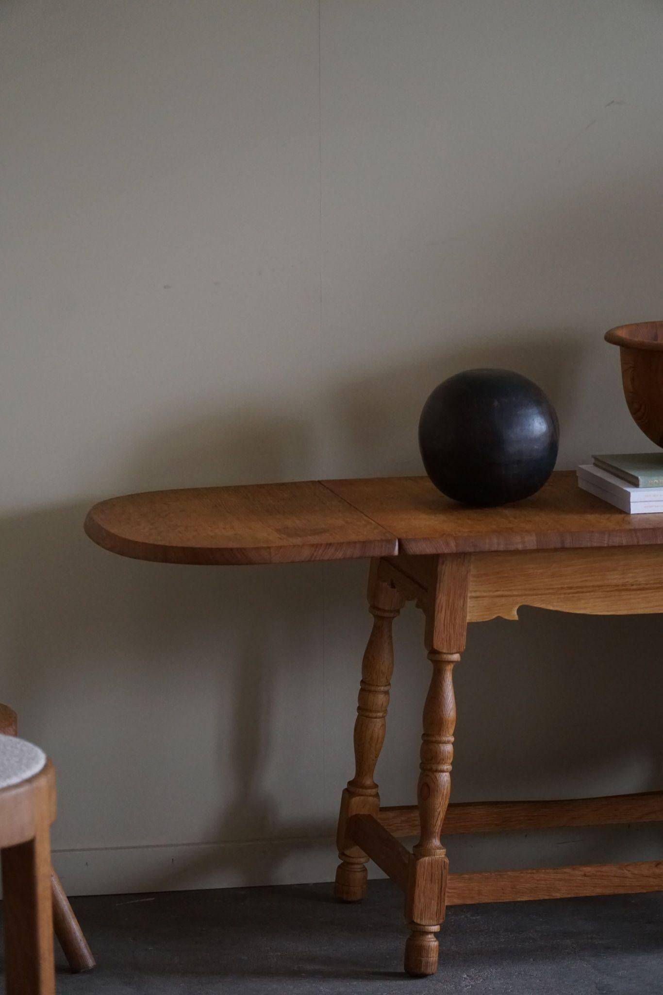Danish mid-century folding side table in oak, Henning Kjærnulf, 1960s.