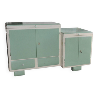 Art Deco washbasin furniture in green and white wood with a glass top, storage from the 1930s.