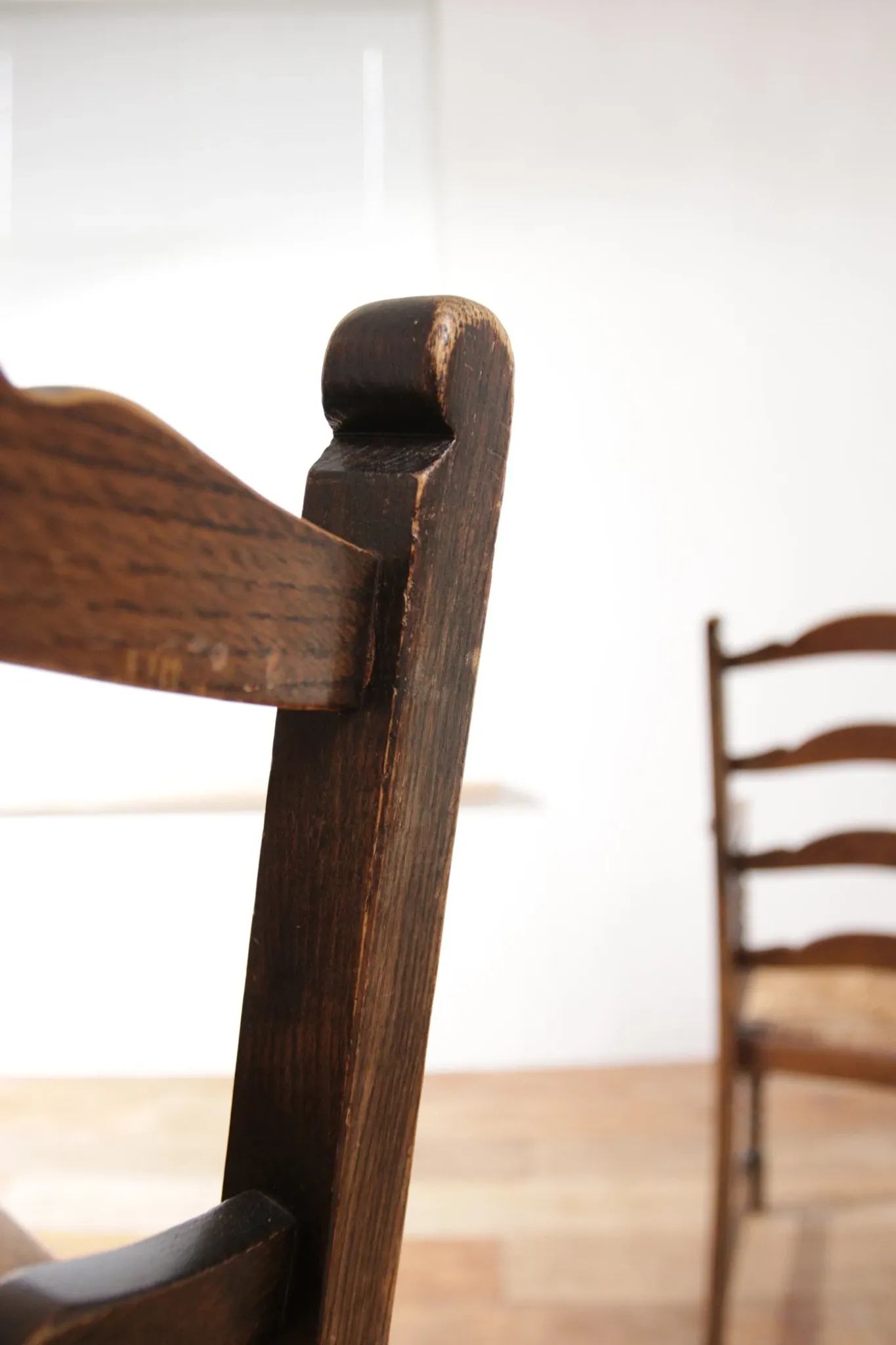 Pair of English oak armchairs with ladder back and rush seats