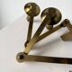 Pair of brass wall lights with articulated arms from the 70s