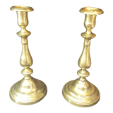Chiseled gilded metal candlesticks
