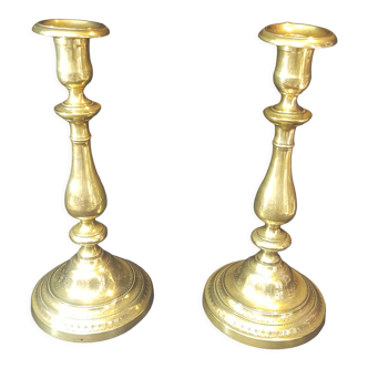 Chiseled gilded metal candlesticks